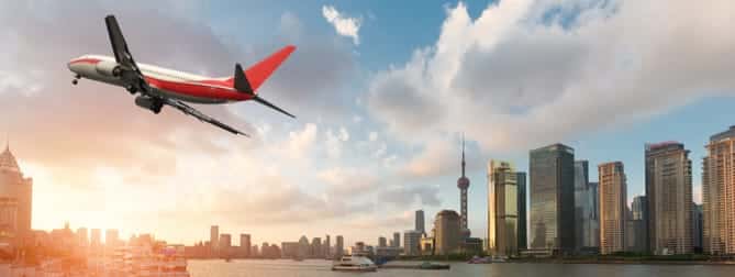 Commercial airline flying over Shanghai