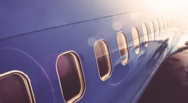 Side, long shot of a blue aeroplane