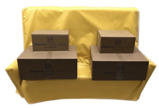 Cardboard boxes hold down yellow cargoseat covers