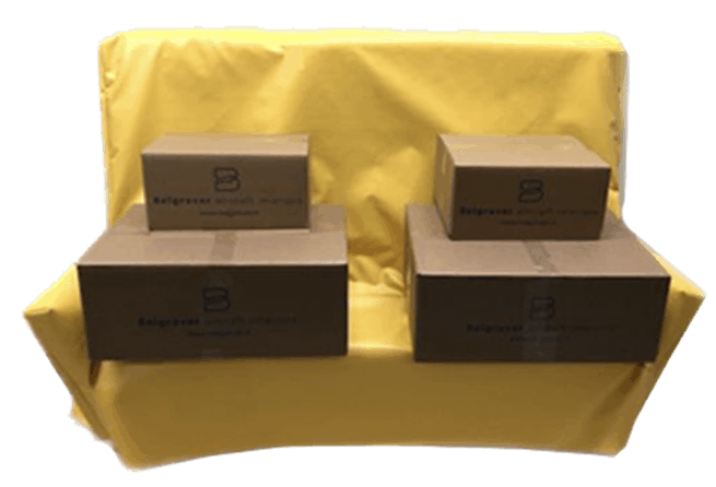 Cardboard boxes hold down yellow cargoseat covers